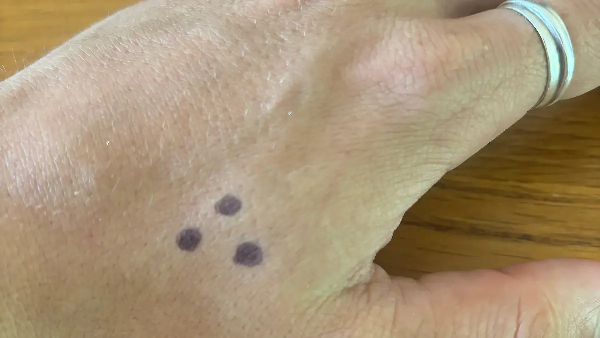 Why the Mysterious 'Three Dots' Tattoo Is Causing a Stir